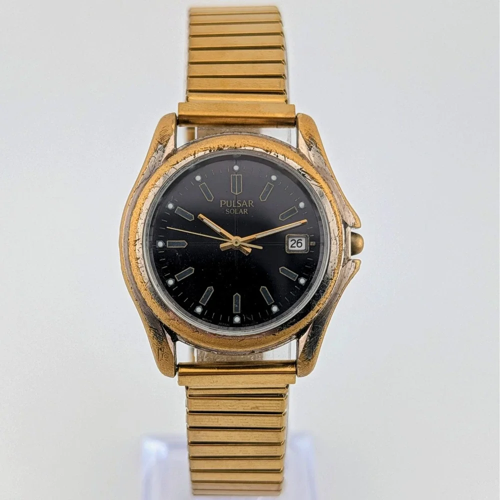 Vintage Pulsar Solar V145 Men's 36mm Gold Tone Black Dial Lume Date Watch